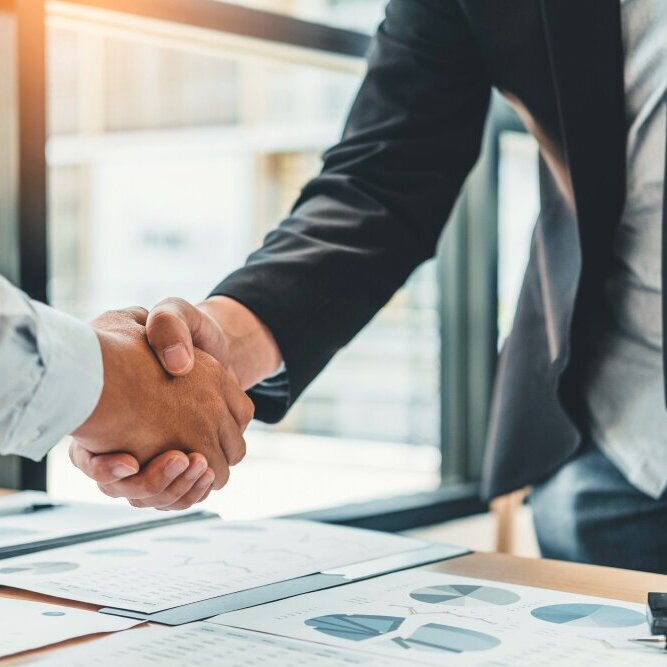 business-people-colleagues-shaking-hands-meting-planning-strategy-analysis